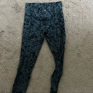 Athleta Salutation Stash pocket tight. Size small. Green/black snakeskin print.